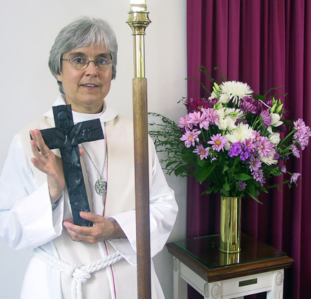 Catherine with cross and Altar flowers